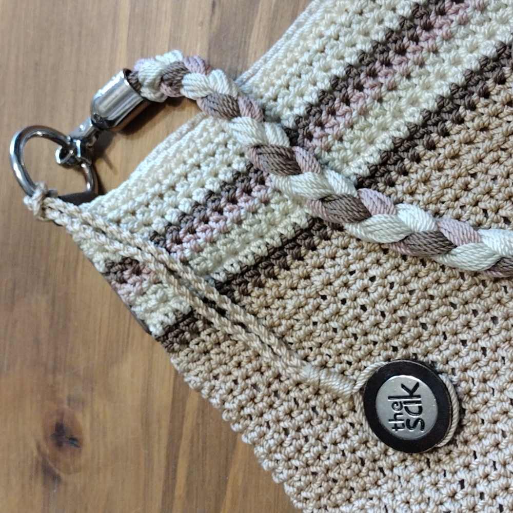 THE SAK boho crossbody bag in cream, latte, and pink crochet